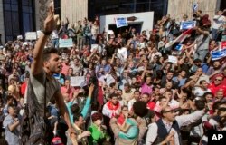 FILE - Egyptians shout slogans against Egyptian President Abdel-Fattah el-Sissi during a protest against the decision to hand over control of two strategic Red Sea islands to Saudi Arabia in front of the Press Syndicate, in Cairo, Egypt, April 15, 2016.