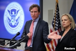 U.S. Secretary of Homeland Security Kirstjen Nielsen and Under Secretary Chris Krebs speak to reporters at the DHS Election Operations Center and National Cybersecurity and Communications Integration Center, Nov. 6, 2018.