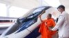 一名和尚在为中老高速火车即将开通的佛教仪式上为这一项目祝福。（2021年12月2日）