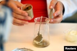 Nina Liland, scientist for the Aquafly project at the Institute of Marine Research investigates how insects can be used to make feed for Norway's salmon farms, in Bergen, Norway, July 31, 2018.
