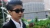 This photograph taken on April 2, 2013 shows Singaporean artist Samantha Lo Xin Hu, 26, arriving at the Subordinate courts in Singapore.