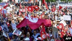 Maandamano kumunga mkono rais wa Tunisia Kais Saied.(Photo by Fethi Belaid / AFP)
