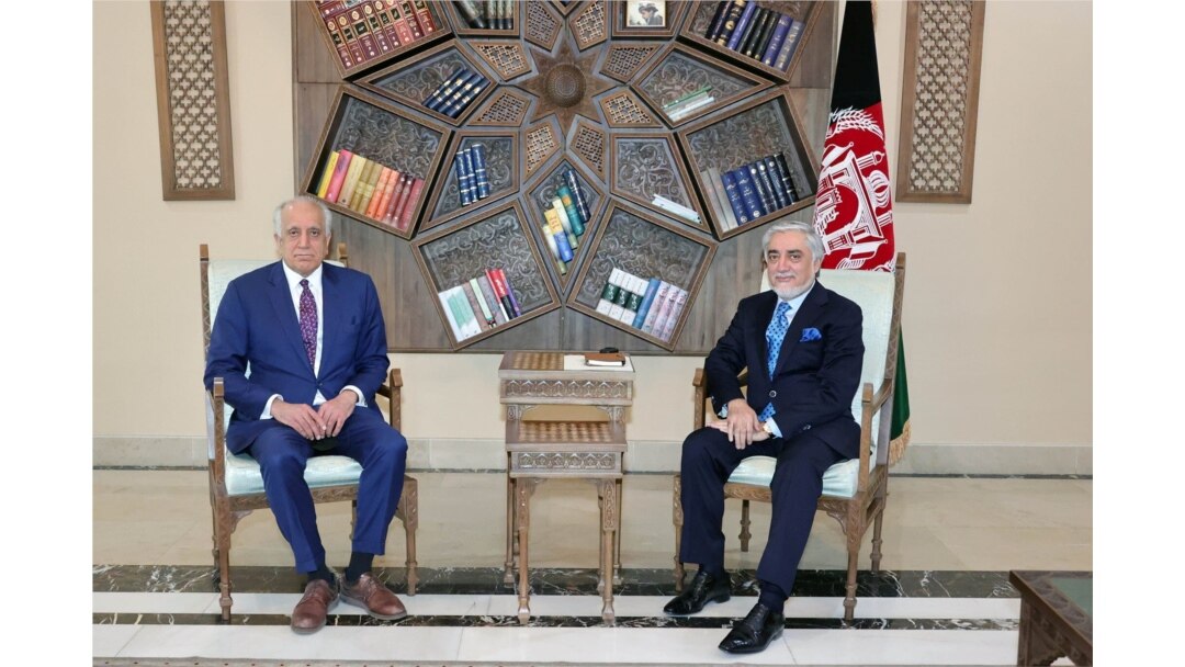 FILE - U.S. envoy for peace in Afghanistan Zalmay Khalilzad meets Abdullah Abdullah, Chairman of the High Council for National Reconciliation in Kabul, Afghanistan, March 1, 2021.