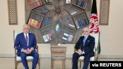 U.S. envoy for peace in Afghanistan Zalmay Khalilzad meets Abdullah Abdullah, Chairman of the High Council for National Reconciliation in Kabul, Afghanistan, March 1, 2021. 