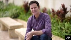 Juan Carlos Cruz, victim of Chilean pedophile priest Fernando Karadima, poses for a portrait in San Juan, Puerto Rico, Feb. 11, 2018. Cruz will testify on Feb. 17, 2018 before the Vatican's onetime sex crimes investigator.