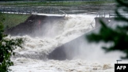 Water flows after the dam burst at the Braskereidfoss power plant in southern Norway, with water flowing into the Glomma River after floodgates did not open properly on Aug. 9, 2023.