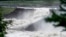 Water flows after the dam burst at the Braskereidfoss power plant in southern Norway, with water flowing into the Glomma River after floodgates did not open properly on Aug. 9, 2023.