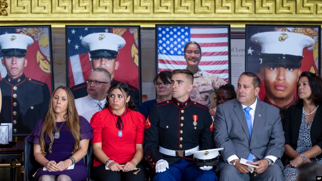 The families of American service members who were killed during the August 2021 withdrawal from Afghanistan, listen as the fallen are posthumously presented Congress' highest honor, the Congressional Gold Medal, at the Capitol in Washington, Sept. 10, 2024.