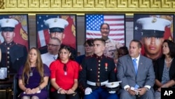 The families of American service members who were killed during the August 2021 withdrawal from Afghanistan, listen as the fallen are posthumously presented Congress' highest honor, the Congressional Gold Medal, at the Capitol in Washington, Sept. 10, 2024.