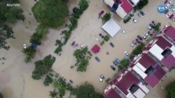 Filipinler’de Tayfun Malezya’da Sel