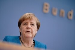 German Chancellor Angela Merkel holds her annual summer news conference in Berlin, Germany, Aug. 28, 2020.