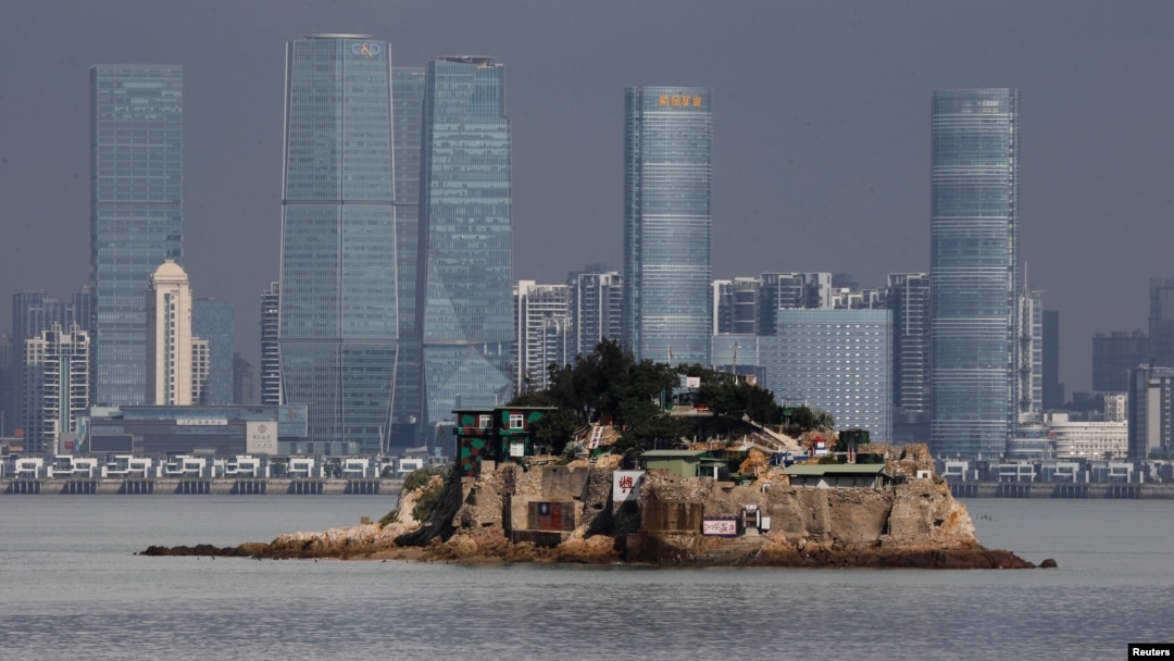 FILE - Shiyu, or Lion Islet, which is part of Kinmen county, one of Taiwan's offshore islands, is seen in front of China's Xiamen, on Lieyu island, Kinmen county, Taiwan, Aug. 20, 2018. 