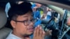 Mech Dara, an award-winning Cambodian journalist who was arrested on charges of inciting social unrest, speaks to members of the media as he leaves Kandal provincial prison on bail, in Phnom Penh, Cambodia, Oct. 24, 2024.