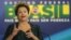 Brazil's President Dilma Rousseff gestures during an announcement of the construction of the first 50 port terminals for private use (TUP), at the Planalto Palace in Brasilia, July 3, 2013. 