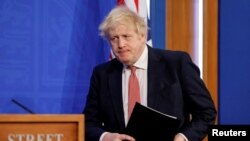 Waziri Mkuu wa Uingereza Boris Johnson mara baada ya kuelezea kuondoa masharti ya COVID huko London