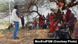 Indigenous Kenyan men attend a training session on ending female genital mutilation in Olmoti village, Kajiado County, Kenya in April 2024.