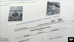 The criminal complaint filed against Nasir Ahmad Tawhedi, 27, of Oklahoma City is pictured Oct. 8, 2024, after the FBI arrested the man who officials say was inspired by the Islamic State group and was plotting an Election Day attack in the U.S.