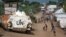 FILE - A U.N. armored personnel vehicle stops in a refugee camp in Juba South Sudan, July 25, 2016.