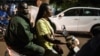 BURKINA Faso elections - woman motorcycle - street scene - ballot transport