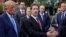Meta CEO Mark Zuckerberg gestures, flanked by US President Donald Trump, as they speak to the press at the White House driveway following a luncheon for tech leaders in the East Room, in Washington, D.C., US, September 29, 2026. 