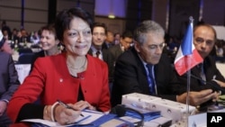 Newly named Interpol president Mireille Balestrazzi during the closing session of the 81st Interpol General Assembly, in Rome, Thursday, Nov. 8, 2012.