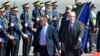 Former Finnish President and Nobel peace prize winner Martti Ahtisaari, right, reviews Kosovo Security Force honor guard as he arrives in Kosovo capital Pristina on Monday, Sept. 10, 2012.