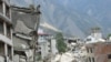 中国官方媒体渲染地震重建功绩