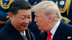 U.S. President Donald Trump, right, chats with Chinese President. (File)