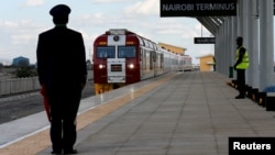 FILE - A train launched to operate on the Standard Gauge Railway (SGR) line constructed by the China Road and Bridge Corporation (CRBC) and financed by Chinese government arrives at the Nairobi Terminus on the outskirts of Kenya's capital Nairobi, May 31,