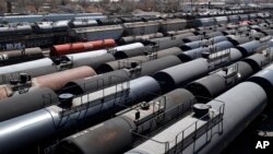 With the world awash in oil, tank train cars sit idle on April 21, 2020, in East Chicago.