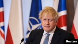 Perdana Menteri Inggris Boris Johnson di Warsawa, Polandia 10 Februari 2022. (Foto: Slawomir Kaminski/Agencja Wyborcza.pl via REUTERS)