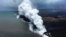 In this May 26, 2018, image from video released by the U.S. Geological Survey, lava sends up clouds of steam and toxic gases as it enters the Pacific Ocean as Kilauea Volcano continues its eruption cycle near Pahoa on the island of Kilauea, Hawaii.