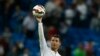 FILE - In this Sept. 23, 2014 file photo Real's Cristiano Ronaldo holds the ball as he celebrates his four goals during a Spanish La Liga soccer match between Real Madrid and Elche at the Santiago Bernabeu stadium in Madrid, Spain. Ronaldo is one of the t