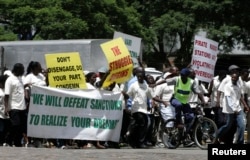 FILE - Supporters of the Zimbabwe African National Union's Patriotic Front (ZANU-PF) march in Harare to protest against a European Union decision to extend economic sanctions on Zimbabwe, Feb. 24, 2010.