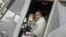 Indian Defense Minister A.K. Antony waves while sitting in the cockpit of an Indian Air Force Mi-17 V5 helicopter during its induction ceremony in New Delhi, India, Feb. 17, 2012.