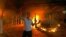 A protester reacts as the U.S. Consulate in Benghazi is seen in flames during a protest by an armed group said to have been protesting a film being produced in the United States September 11, 2012. 