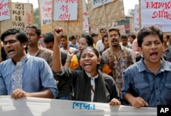 Bangladeshi youth shout slogans as they protest the killing of Faisal Arefin Deepan, a publisher of secular books, in Dhaka, Bangladesh, Nov. 1, 2015.
