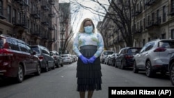 Tiffany Pinckney poses for a portrait in the Harlem neighborhood of New York on April 1, 2020.