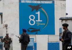 Indian soldiers stand guard outside an airbase in Pathankot, Jan. 4, 2016.