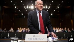 CIA Director John Brennan arrives on Capitol Hill in Washington, June 16, 2016, to testify before the Senate Intelligence Committee hearing on the Islamic State.