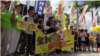 香港多个团体星期天举行“全民拒绝假普选运动”的步行宣讲活动（美国之音谭嘉琪拍摄） 
