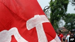A giant flag carried by a Maoist demonstrator on the streets of Kathmandu (File)