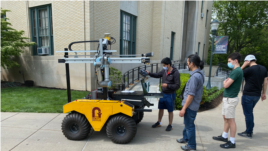 Students work together teaching an agricultural robot on the campus of Carnegie Mellon University in Pittsburgh.