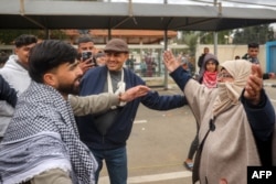 One of the Palestinian prisoners released in the fifth hostage-prisoner swap under the Gaza ceasefire deal rushes to embrace his mother upon arrival at the European Hospital in Khan Younis in the southern Gaza Strip, Feb. 8, 2025.