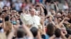 Pope Francis greets supporters on Aug. 8, 2014.