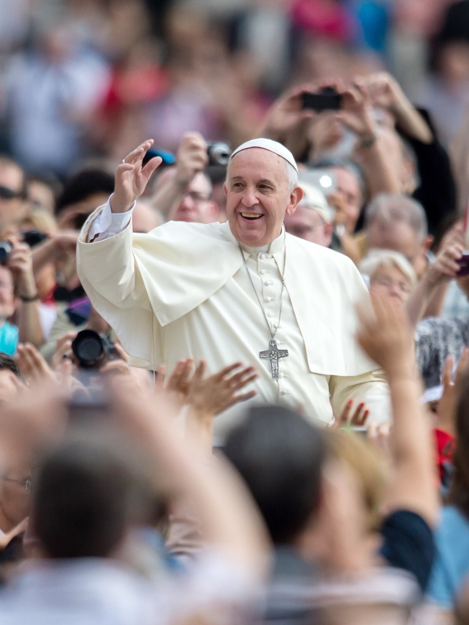 Pope Francis greets supporters on Aug. 8, 2014.