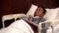 FILE - Pervez Musharraf, Pakistan's former military leader, is seen in a hospital bed in Dubai, United Arab Emirates, Dec. 18, 2019, in a still image taken from video. (All Pakistan Muslim League handout via Reuters)