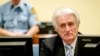 Ex-Bosnian Serb leader Radovan Karadzic sits in the court of the International Criminal Tribunal for former Yugoslavia (ICTY) in the Hague, the Netherlands, March 24, 2016. 