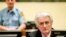FILE - Ex-Bosnian Serb leader Radovan Karadzic sits in the court of the International Criminal Tribunal for former Yugoslavia (ICTY) in the Hague, the Netherlands, March 24, 2016. 