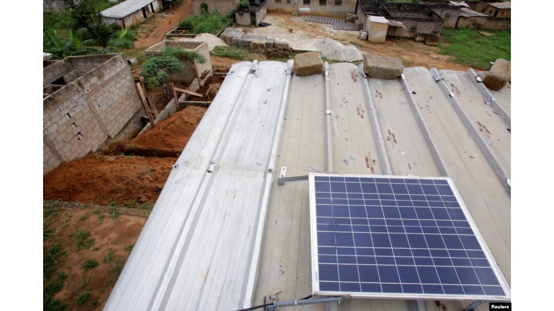 A solar panel is pictured on the roof of Jean-Noel Kouame's house, on the outer edge of Abidjan, Ivory Coast, Dec. 18, 2017.